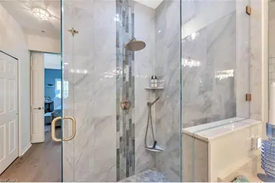 4833 Hampshire Ct #302, Naples, FL 34112 - Photo 18