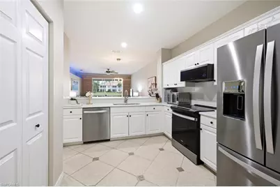 6305 Wilshire Pines Cir #503, Naples, FL 34109 - Photo 10
