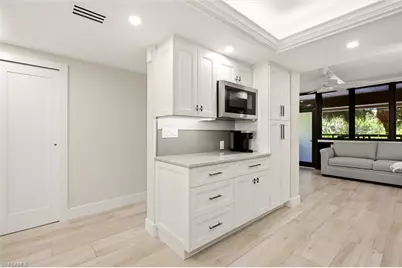 6300 Pelican Bay Blvd #103, Naples, FL 34108 - Photo 12