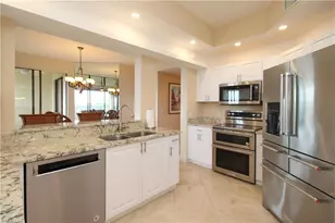 7024 Pelican Bay Blvd, Naples, FL 34108 - Photo 46