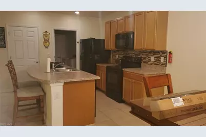 10709 Crossback Ln, Lehigh Acres, FL 33936 - Photo 6