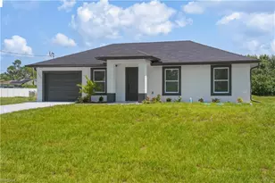 1216 Cordoba St E, Lehigh Acres, FL 33974 - Photo 1