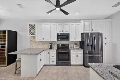 25020 Divot Dr, Bonita Springs, FL 34135 - Photo 10