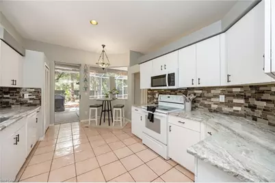 2656 River Reach Dr, Naples, FL 34104 - Photo 8