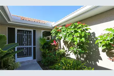402 Emerald Bay Cir #E7, Naples, FL 34110 - Photo 2