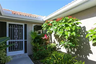 402 Emerald Bay Cir, Naples, FL 34110 - Photo 2