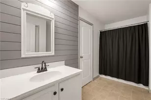 10365 Canal Brook Ln, Lehigh Acres, FL 33936 - Photo 18