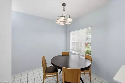 7577 Silver Trumpet Ln #103, Naples, FL 34109 - Photo 14