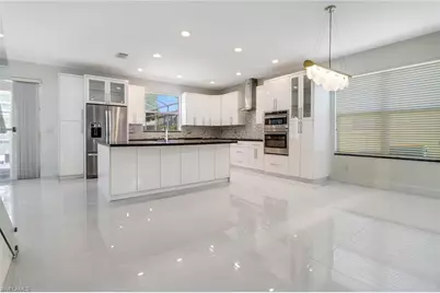 8271 Laurel Lakes Way, Naples, FL 34119 - Photo 10