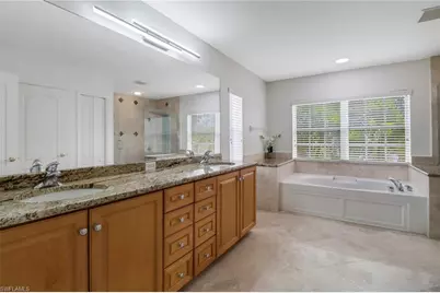 8271 Laurel Lakes Way, Naples, FL 34119 - Photo 24