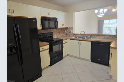 5741 Whitaker Rd #D203, Naples, FL 34112 - Photo 4