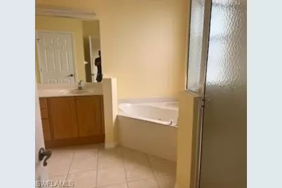 15622 Summit Place Cir #395, Naples, FL 34119 - Photo 2