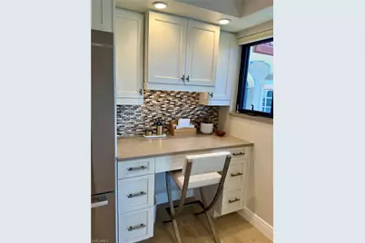 6020 Pelican Bay Blvd #E402, Naples, FL 34108 - Photo 10