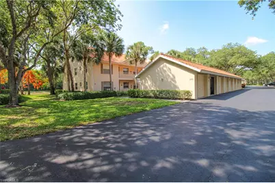 225 Robin Hood Cir #203, Naples, FL 34104 - Photo 1