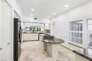 11832 Quail Village Way, Naples, FL 34119 - Photo 18