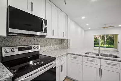 4450 Botanical Place Cir #6, Naples, FL 34112 - Photo 6