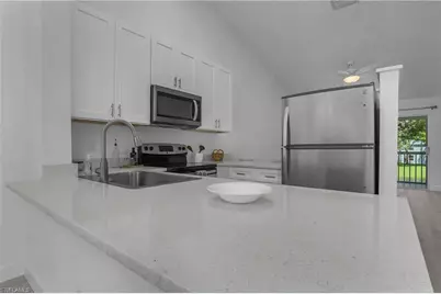 133 Wading Bird Cir #202, Naples, FL 34110 - Photo 8