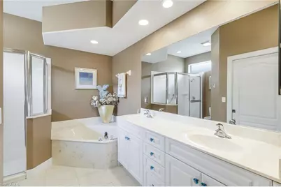 8683 Ibis Cove Cir, Naples, FL 34119 - Photo 12