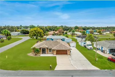 401 Candlewick Cir E, Lehigh Acres, FL 33936 - Photo 48