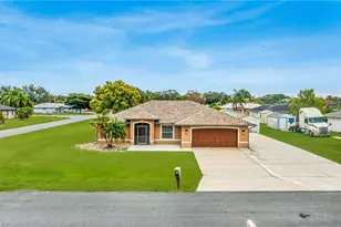 401 Candlewick Cir E, Lehigh Acres, FL 33936 - Photo 1