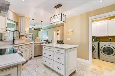 401 Candlewick Cir E, Lehigh Acres, FL 33936 - Photo 28