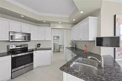 7040 Pelican Bay Blvd #401, Naples, FL 34108 - Photo 14