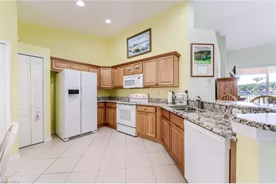 9050 Spring Run Blvd #305, Estero, FL 34135 - Photo 6