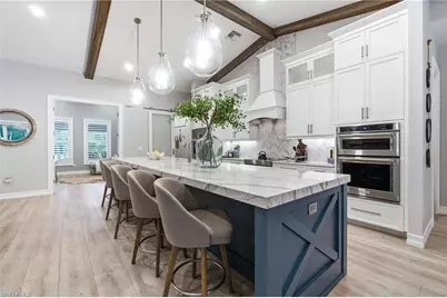5737 Hidden Oaks Ln, Naples, FL 34119 - Photo 30