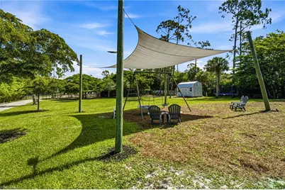 5737 Hidden Oaks Ln, Naples, FL 34119 - Photo 14
