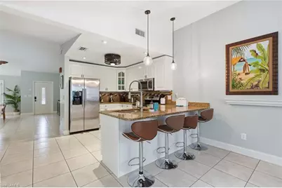 2548 River Reach Dr, Naples, FL 34104 - Photo 2