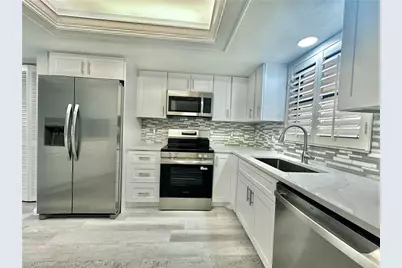 4955 Pepper Cir #B-204, Naples, FL 34113 - Photo 2