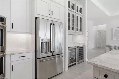 15428 Turin Dr, Naples, FL 34114 - Photo 24