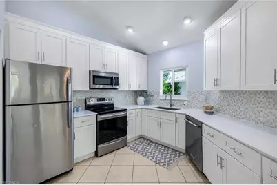 11054 Linnet Ln, Naples, FL 34119 - Photo 10