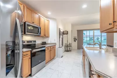 6817 Sterling Greens Dr #102, Naples, FL 34104 - Photo 8