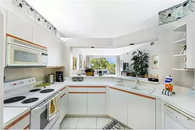 7638 Pebble Creek Cir #4-202, Naples, FL 34108 - Photo 10