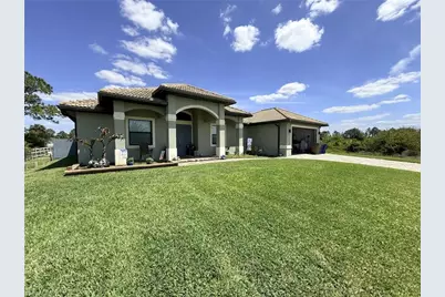 1210 Plumosa Ave, Lehigh Acres, FL 33972 - Photo 1