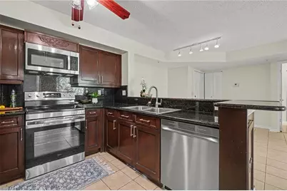 1280 Wildwood Lakes Blvd #106, Naples, FL 34104 - Photo 12