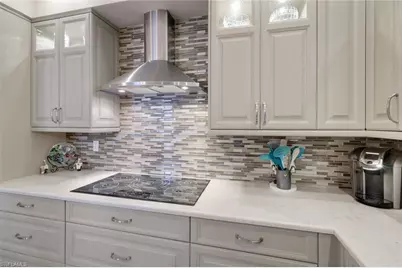 11594 Quail Village Way, Naples, FL 34119 - Photo 18