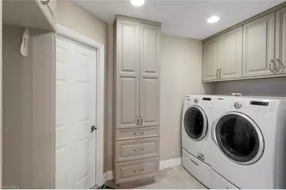11594 Quail Village Way, Naples, FL 34119 - Photo 20