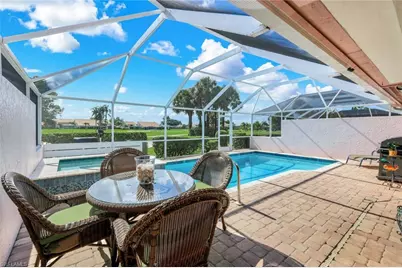 11594 Quail Village Way, Naples, FL 34119 - Photo 4
