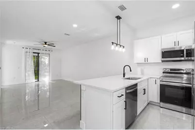 873 Eisenhower Blvd, Lehigh Acres, FL 33974 - Photo 6