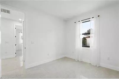 873 Eisenhower Blvd, Lehigh Acres, FL 33974 - Photo 12