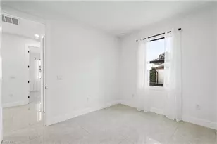 873 Eisenhower Blvd, Lehigh Acres, FL 33974 - Photo 12