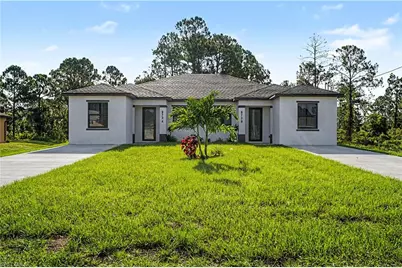 873 Eisenhower Blvd, Lehigh Acres, FL 33974 - Photo 1