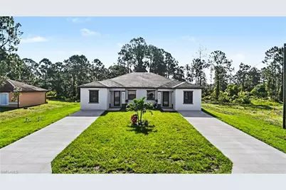 873 Eisenhower Blvd, Lehigh Acres, FL 33974 - Photo 2