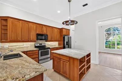 2229 Goshawk Ct, Naples, FL 34105 - Photo 6