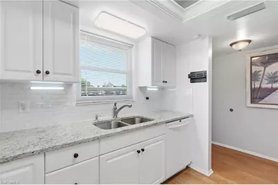 5435 Rattlesnake Hammock #E107, Naples, FL 34113 - Photo 1