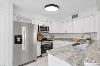 9570 Crescent Garden Dr #A102, Naples, FL 34109 - Photo 22