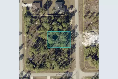 242 McArthur Blvd, Lehigh Acres, FL 33974 - Photo 1