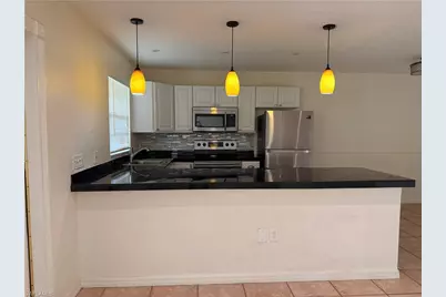 4290 Gulfstream Dr #12, Naples, FL 34112 - Photo 4